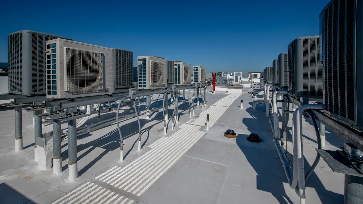 A view of HVAC systems on the rooftop of a building