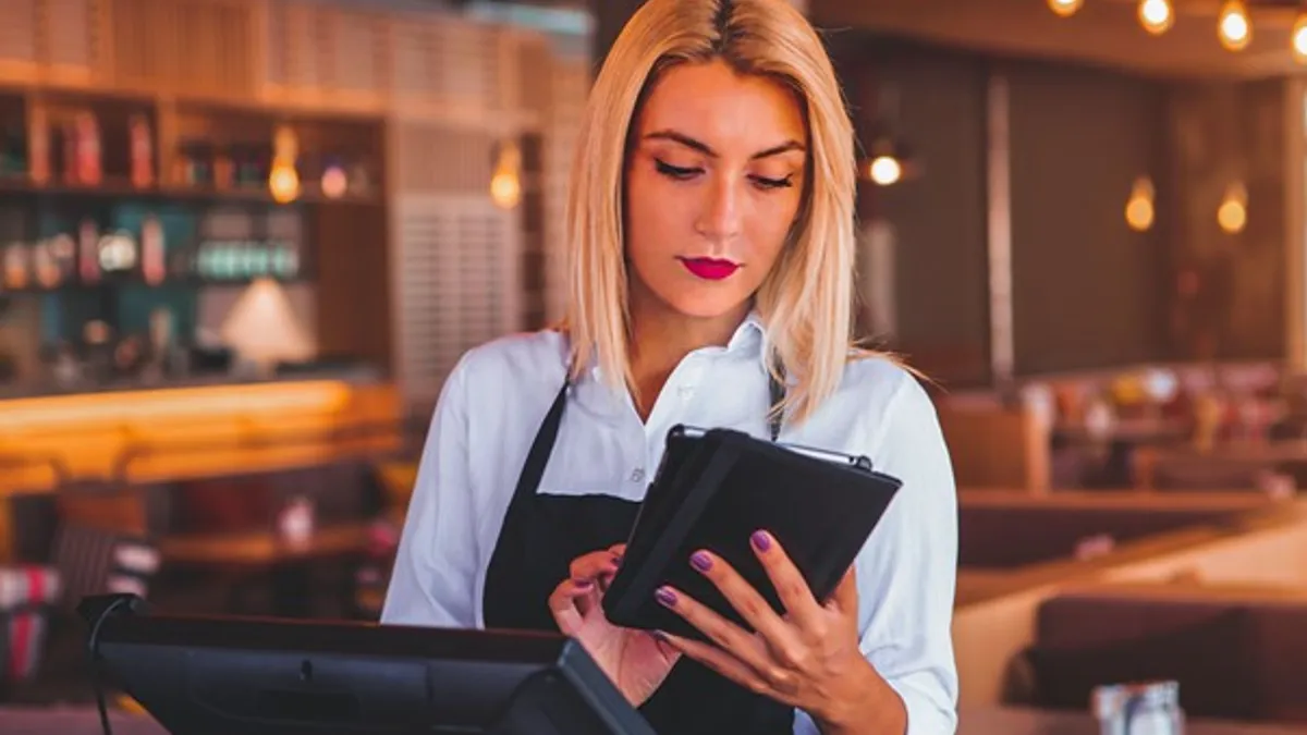 Worker looking at tablet