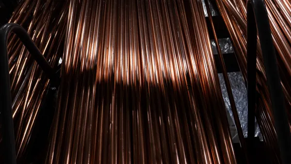 Copper pipes are displayed in a home rebuilding store