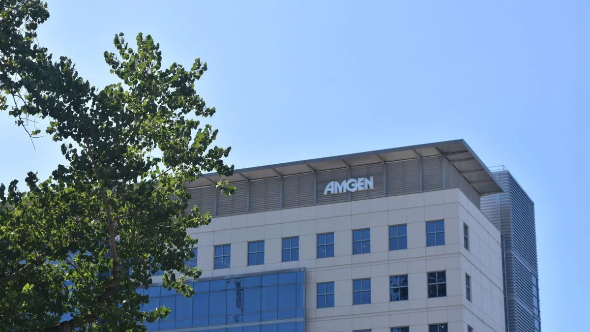 An Amgen logo is displayed on a building in Cambridge, Massachusetts, on Sept. 5, 2024.
