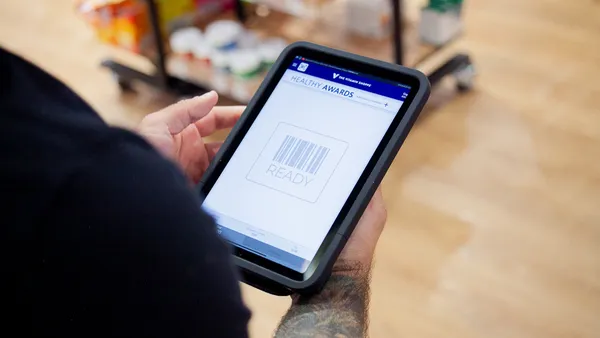 A mobile POS system inside a The Vitamin Shoppe Store.