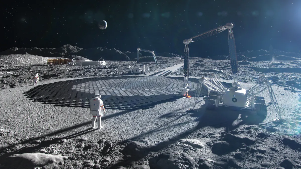 A rendering of astronauts on the moon. The sun shines brightly off of a machine being used for construction. It looks similar to a crane.