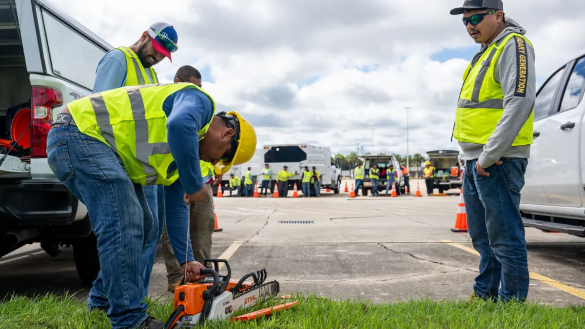 Construction crews gather in preparation to assess damage after Hurricane Francine swept through the area on September 12, 2024 in Houma, Louisiana.