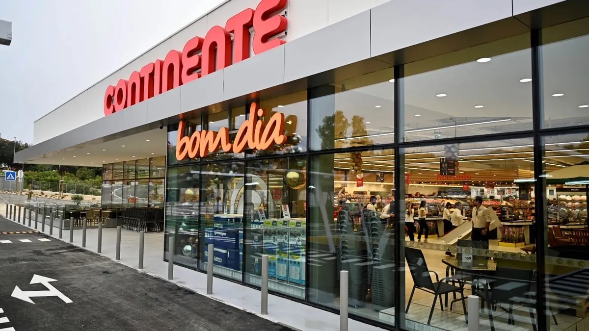 Exterior of a store with a sign saying "Continente Bom Dia."