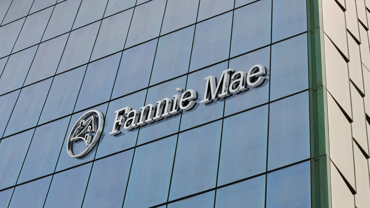 Glass building with Fannie Mae sign.