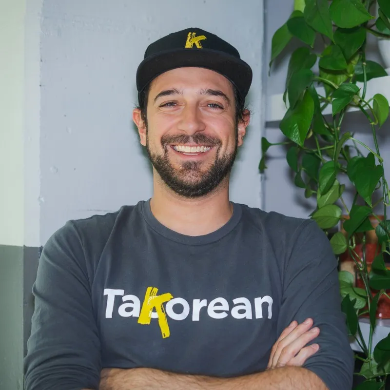 An image of a man in a TaKorean shirt