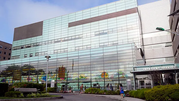 A facade of NYC Health + Hospitals' Queens Hospital in Jamaica, Queens in New York City.