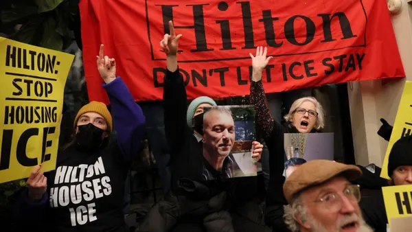 People protest at New York City Hilton hotel
