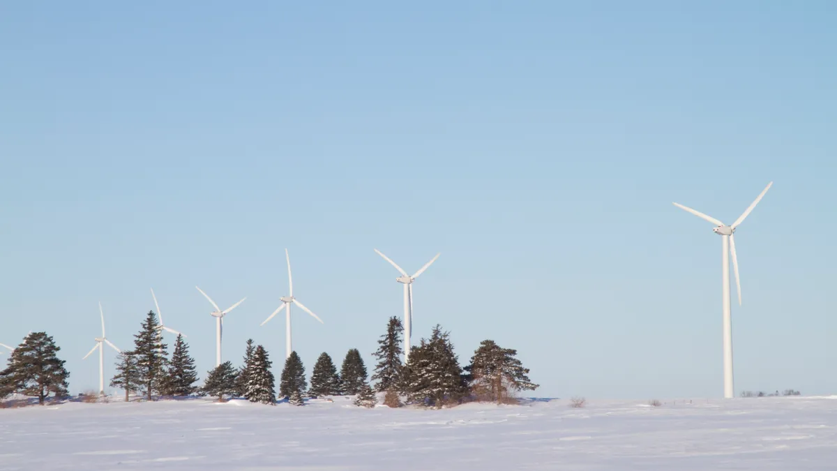 Wind turbines at a wind farm in winter in Iowa.