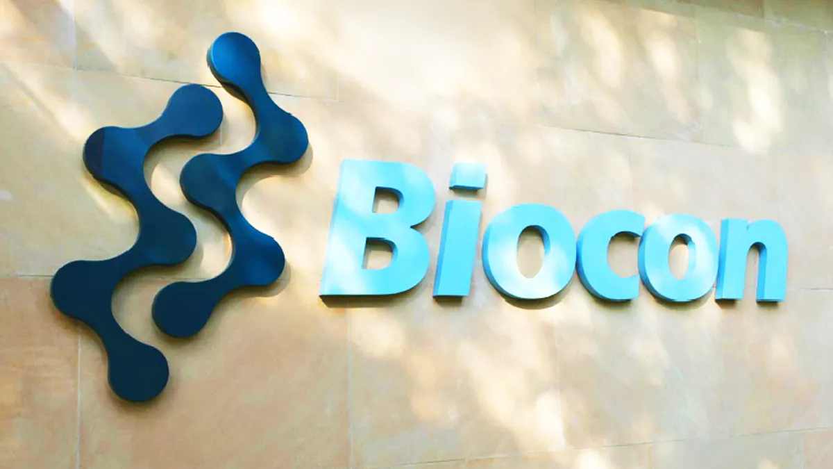 A photo of Biocon's logo on a building