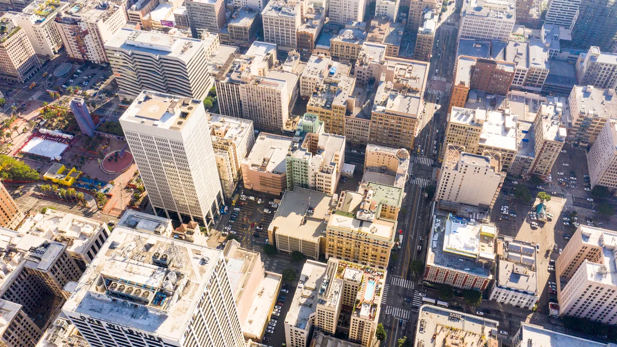 Aerial shot of city buildings on a sunny day