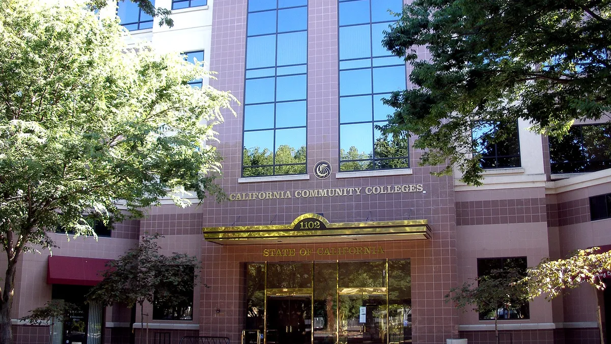 A tall office building with the words "California Community Colleges" on the front.