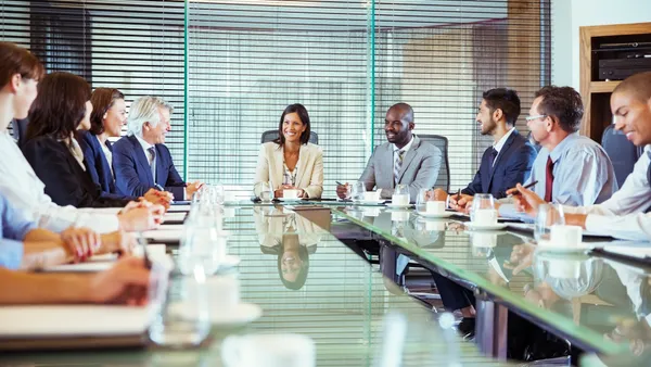 CEO leads a discussion among executives at the company