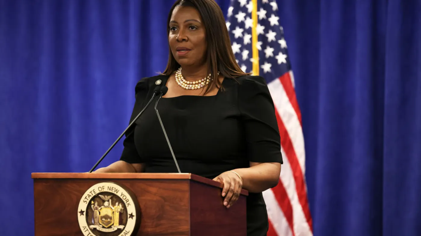 New York Attorney General Letitia James standing at a microphone.