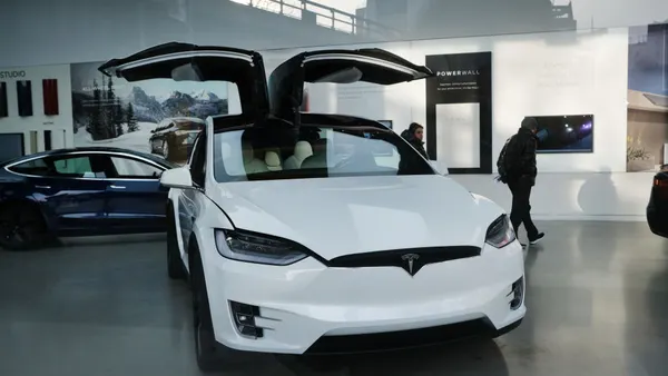 Tesla electric vehicle displayed in Manhattan showroom