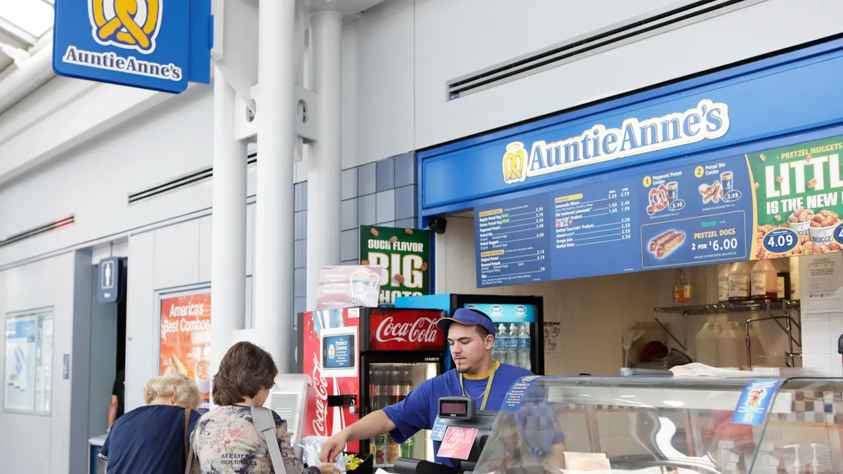A pretzel shop in an airport.