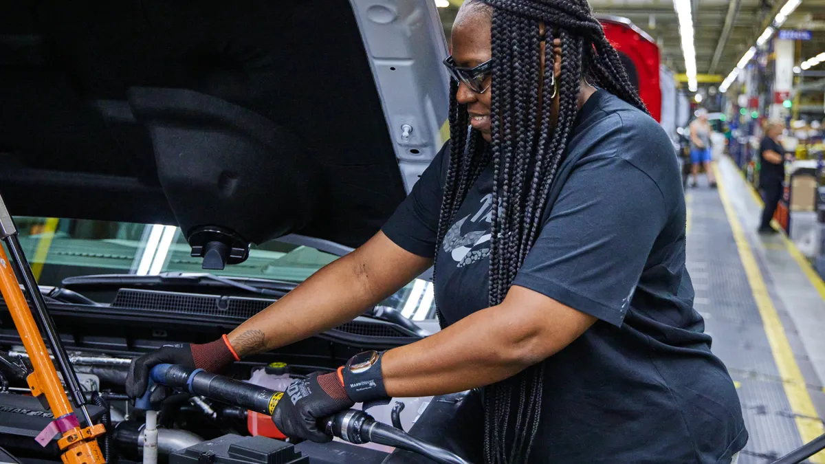 General Motors employee Cozetta Johnson working at Flint Assembly on Monday, June 5, 2023.