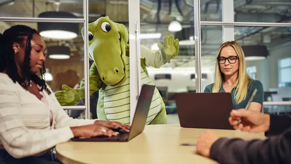 Crocs mascot in an office
