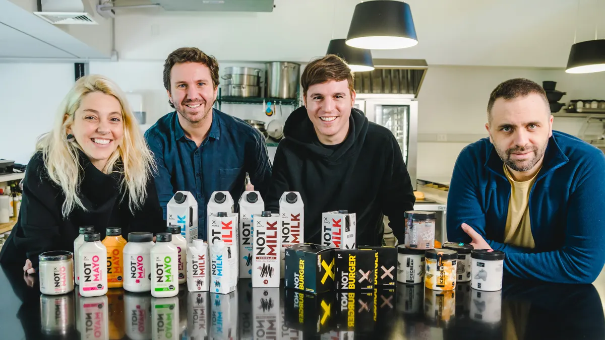 NotCo's leadership team with some of their products