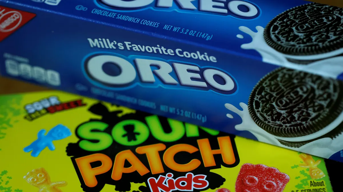 A box of Sour Patch Kids next to a box of Oreos.