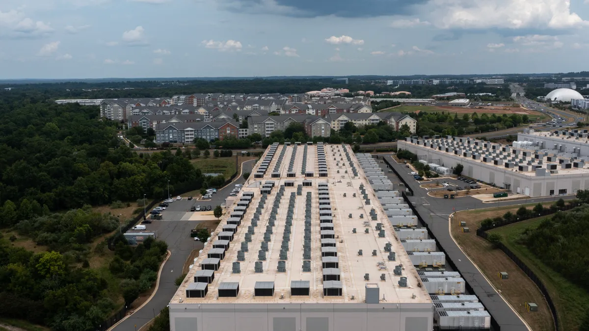 An aerial view of an Amazon Web Services AWS data center in Ashburn, Virginia.