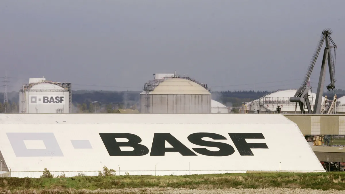 A port facility is pictured, with several elements bearing the name BASF.