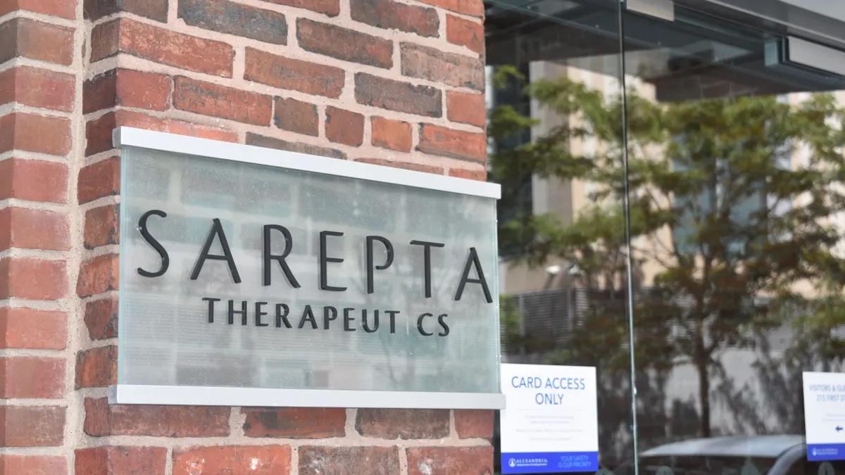 A Sarepta logo is displayed on a building in Cambridge, Massachusetts on Sept. 5, 2024.