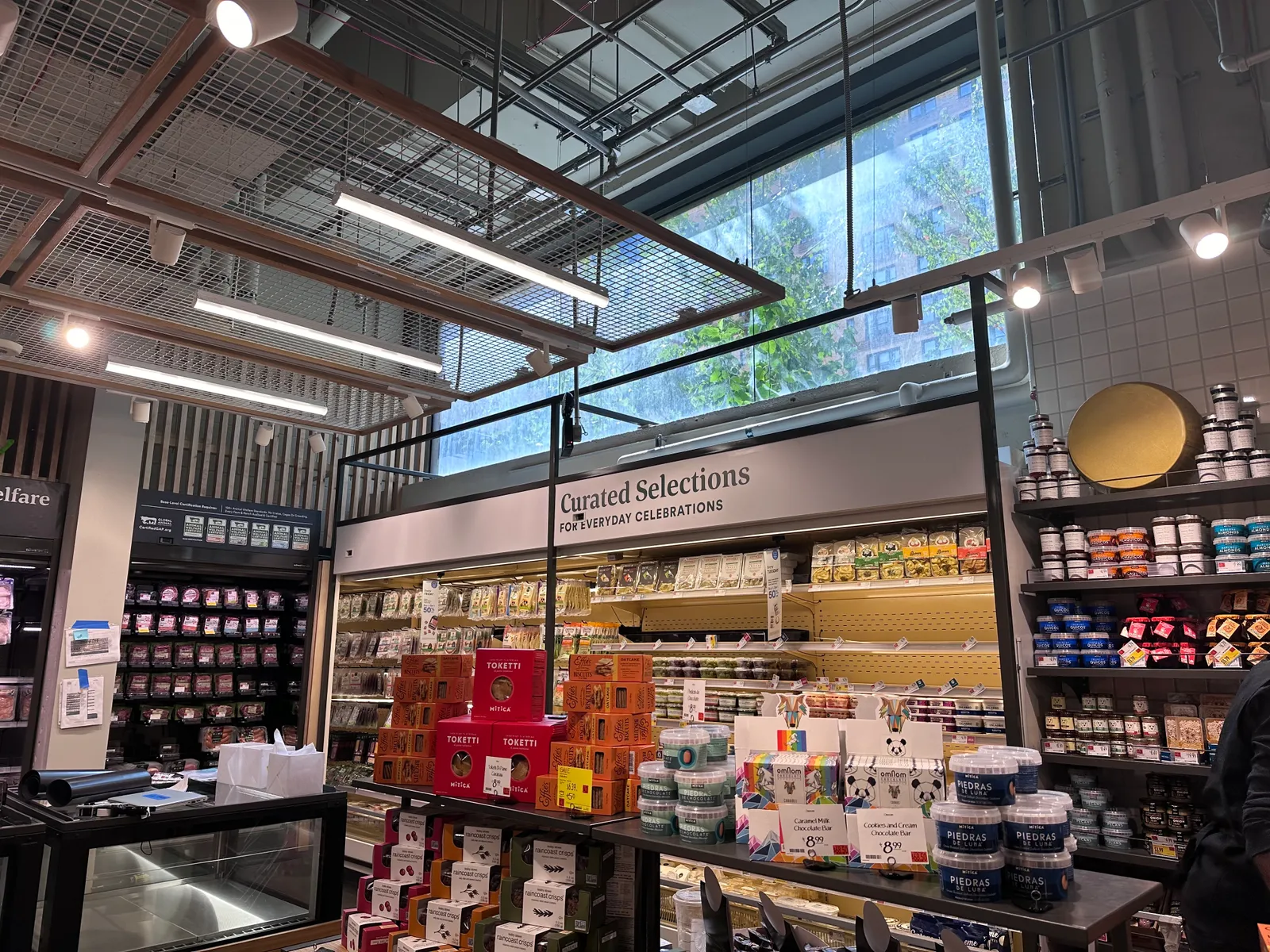 Large window unit above cheese section of Whole Foods&#x27; Daily Shop