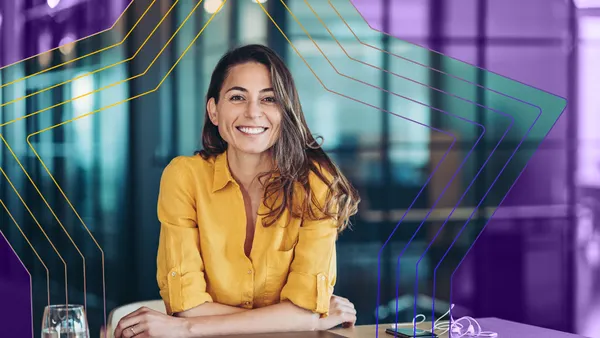 Confident young businesswoman in her office