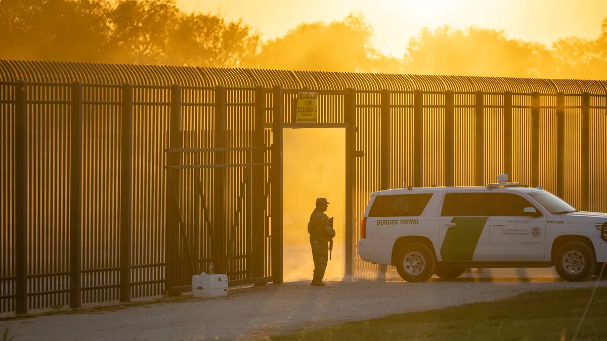 Border Patrol vehicle and immigration enforcement agent