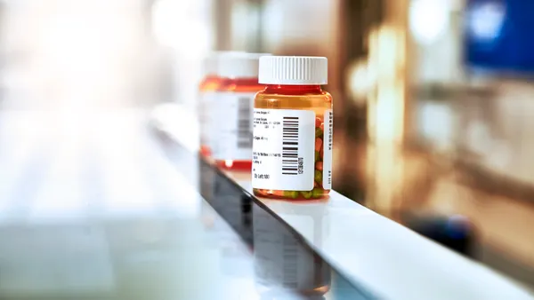 An image of an Express Scripts prescription bottle.