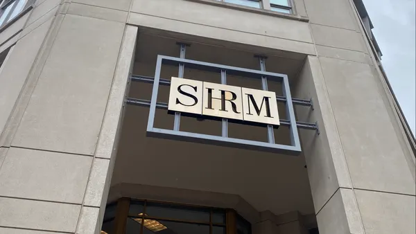 The Society for Human Resource Management logo is visible on the exterior of SHRM HQ