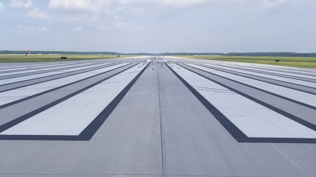 A ground-level view of an airport runway.