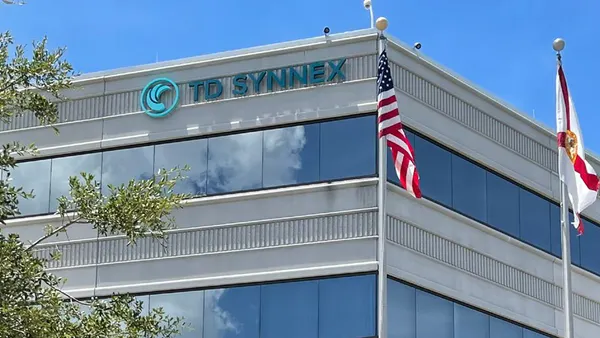 A building with the TD Synnex corporate logo is pictured.