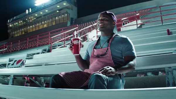 A fan appears in Dr Pepper's Fansville campaign