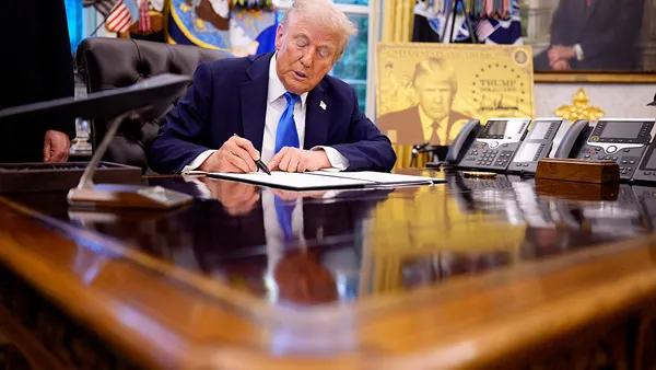 Trump signs H-1B executive order in Oval Office