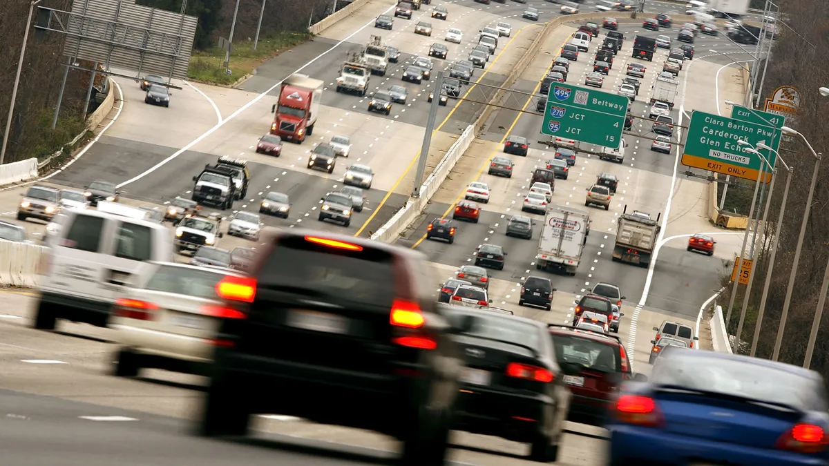 Multiple lanes of vehicles on a highway.