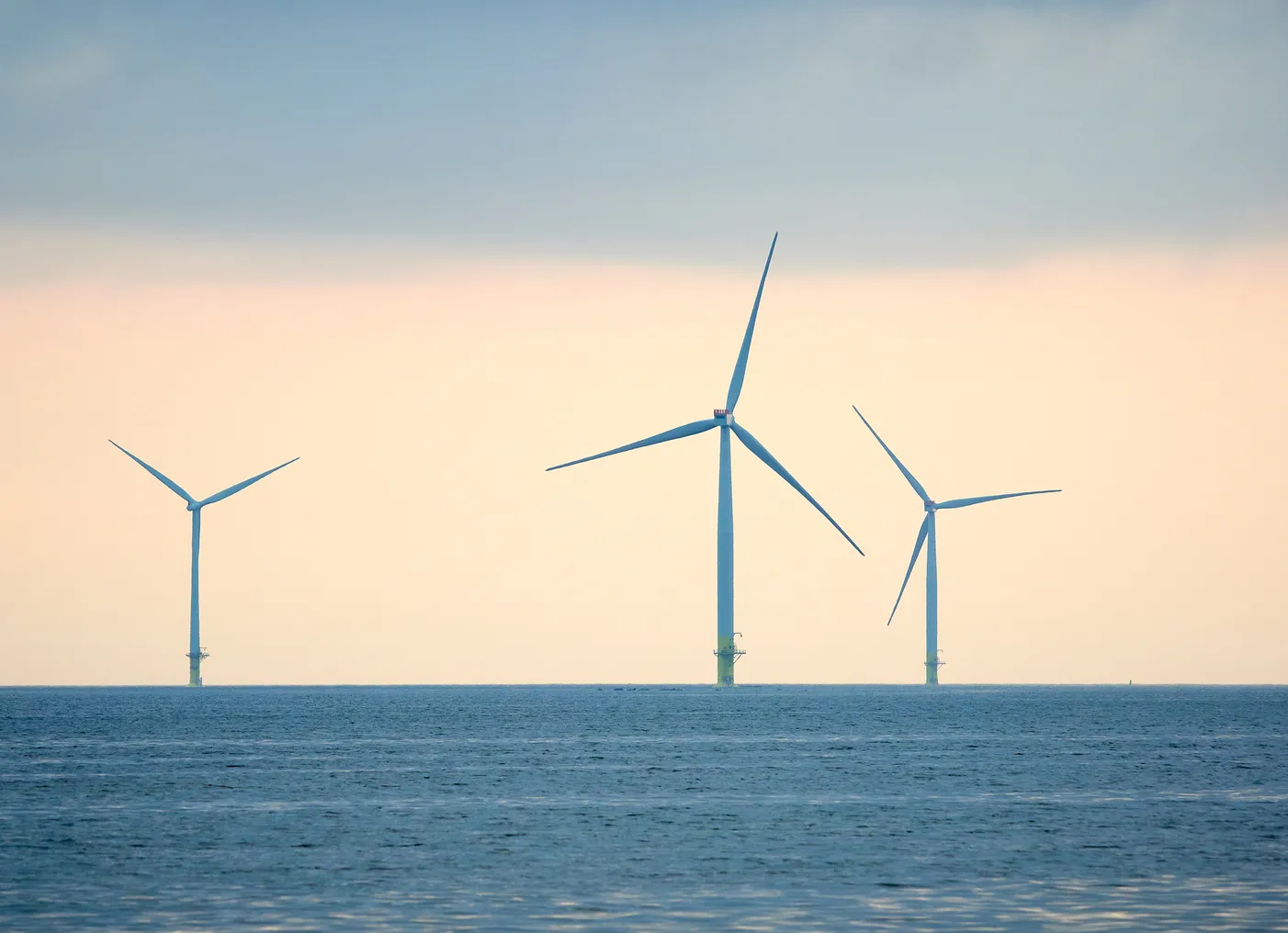 Offshore wind turbines in the ocean.