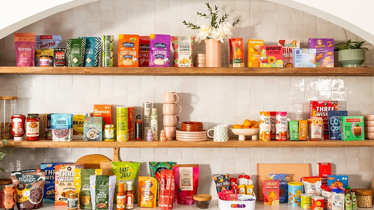 Colorful shelf full of Thrive Market grocery products