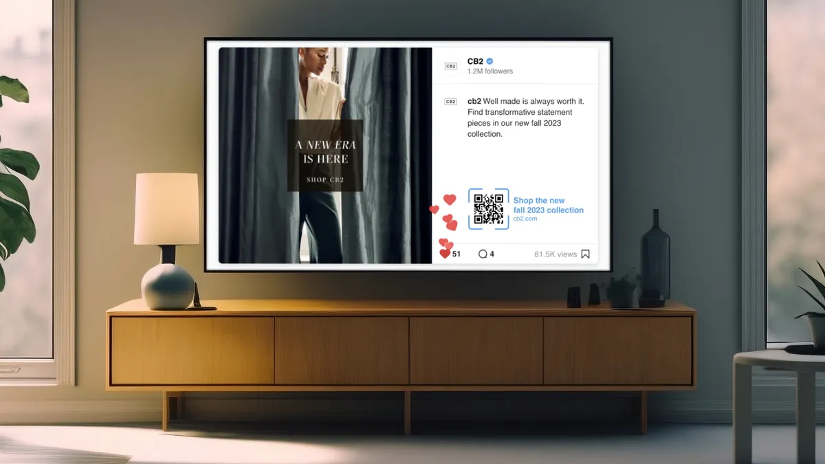 An advertisement for CB2 is displayed on a TV screen.