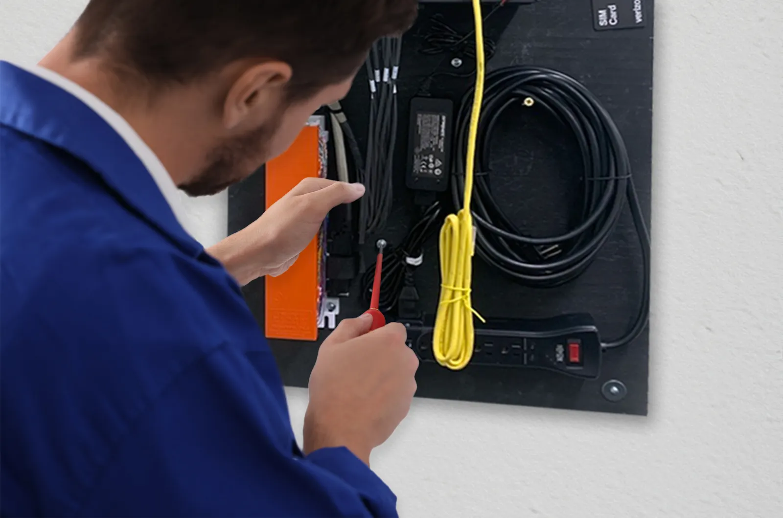 technician installs a phone system