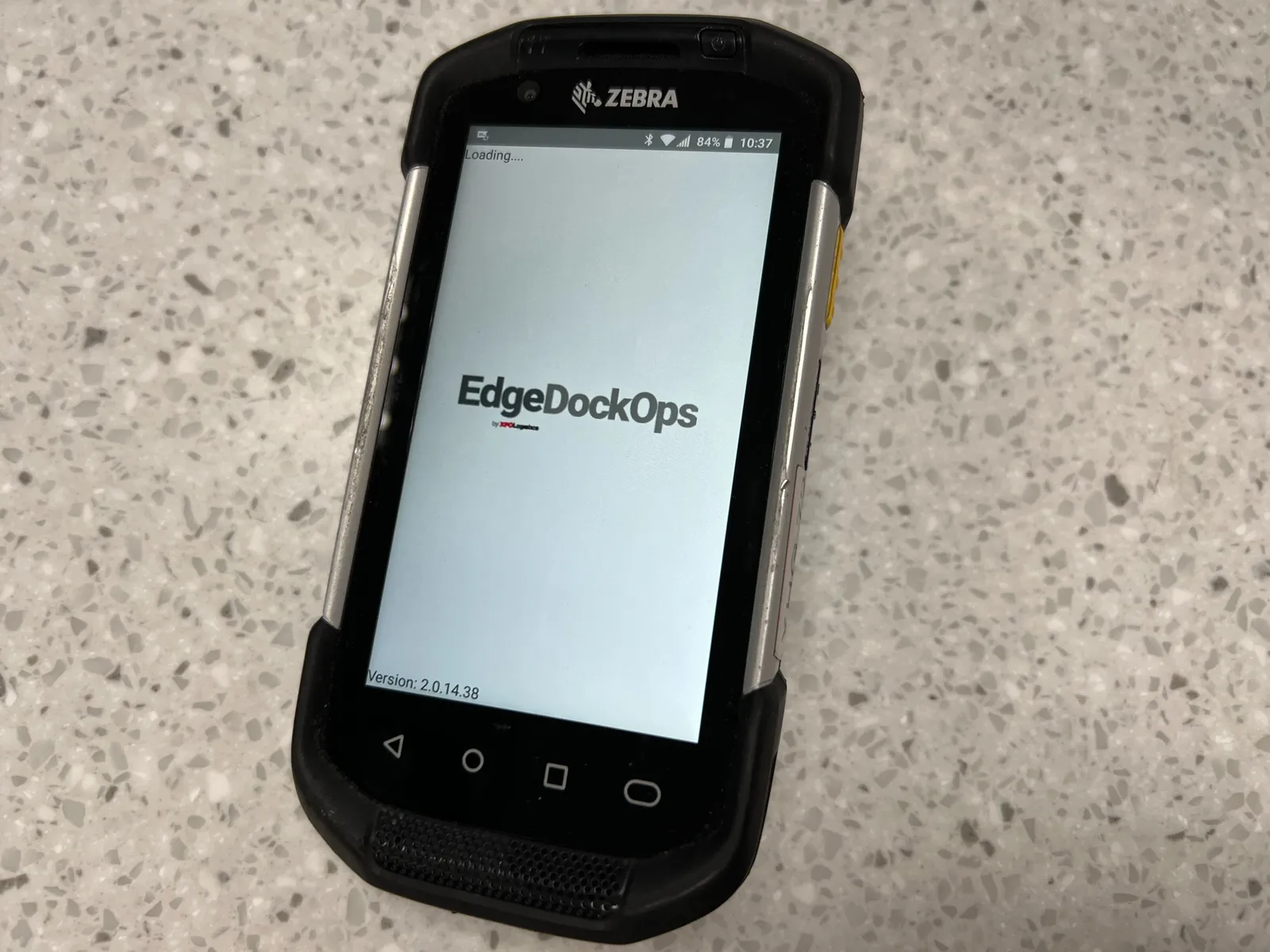 Handheld scanners using XPO's EdgeDockOps technology direct dockworkers where to move loads — and also report productivity metrics to XPO.