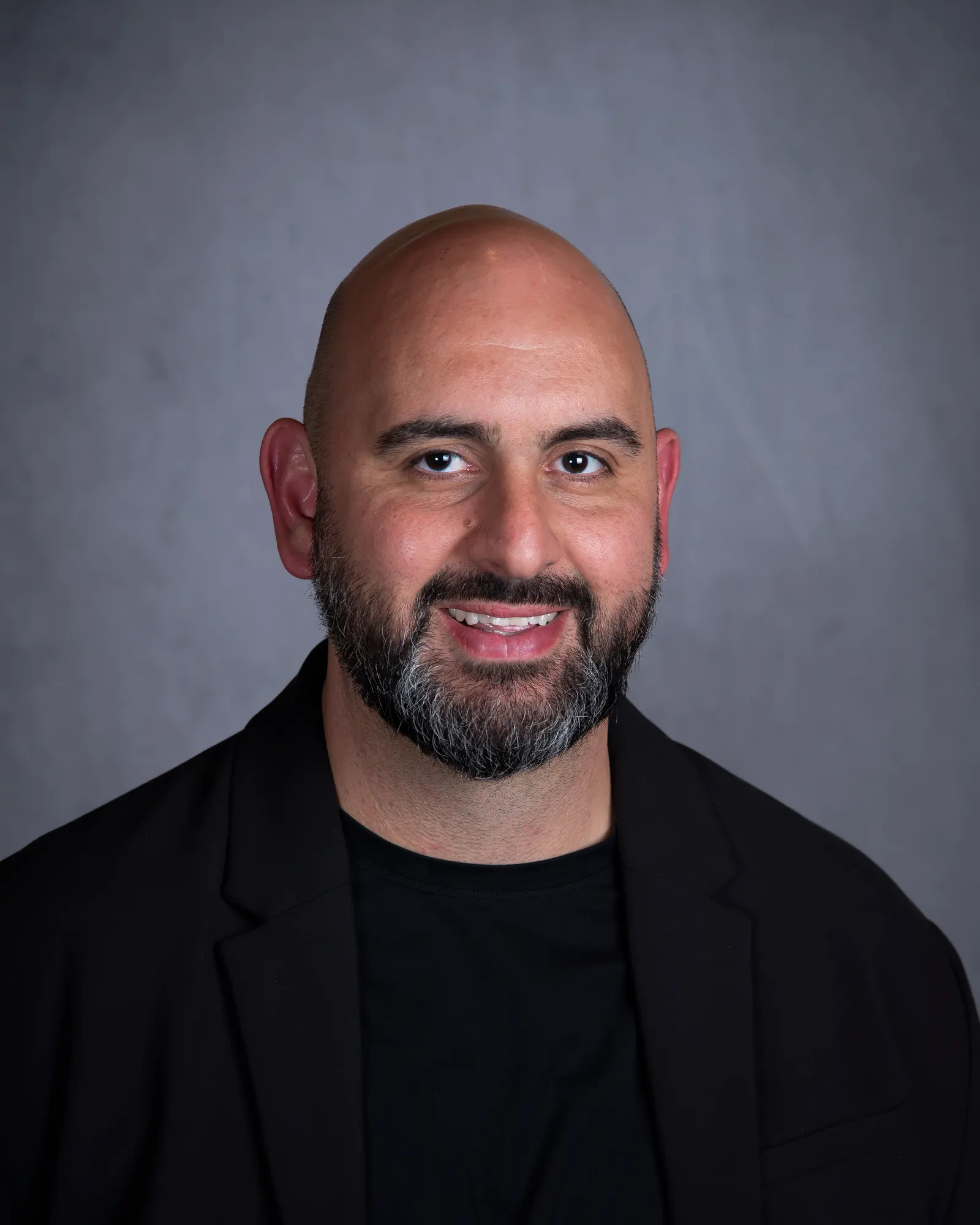 Headshot of Tony Qorri.