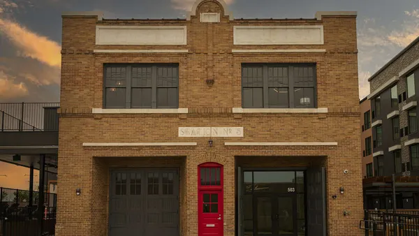 The facade of a historic fire station.