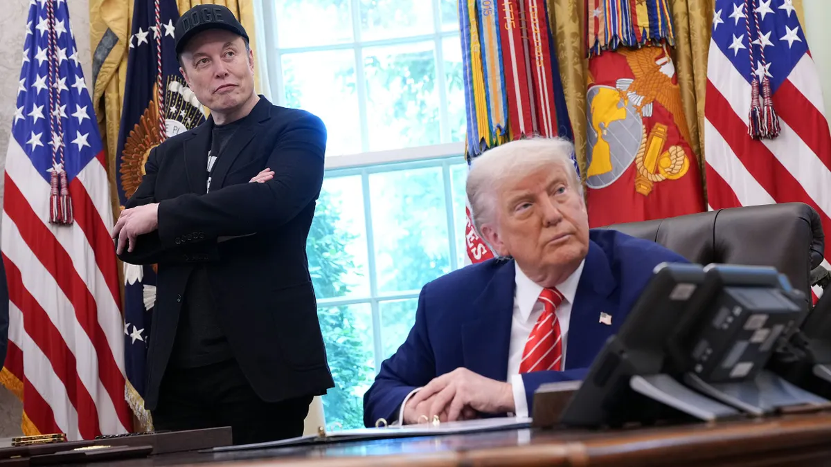 U.S. President Donald Trump and Tesla CEO Elon Musk listen to a reporter's question in the Oval Office of the White House on May 30, 2025 in Washington, DC.