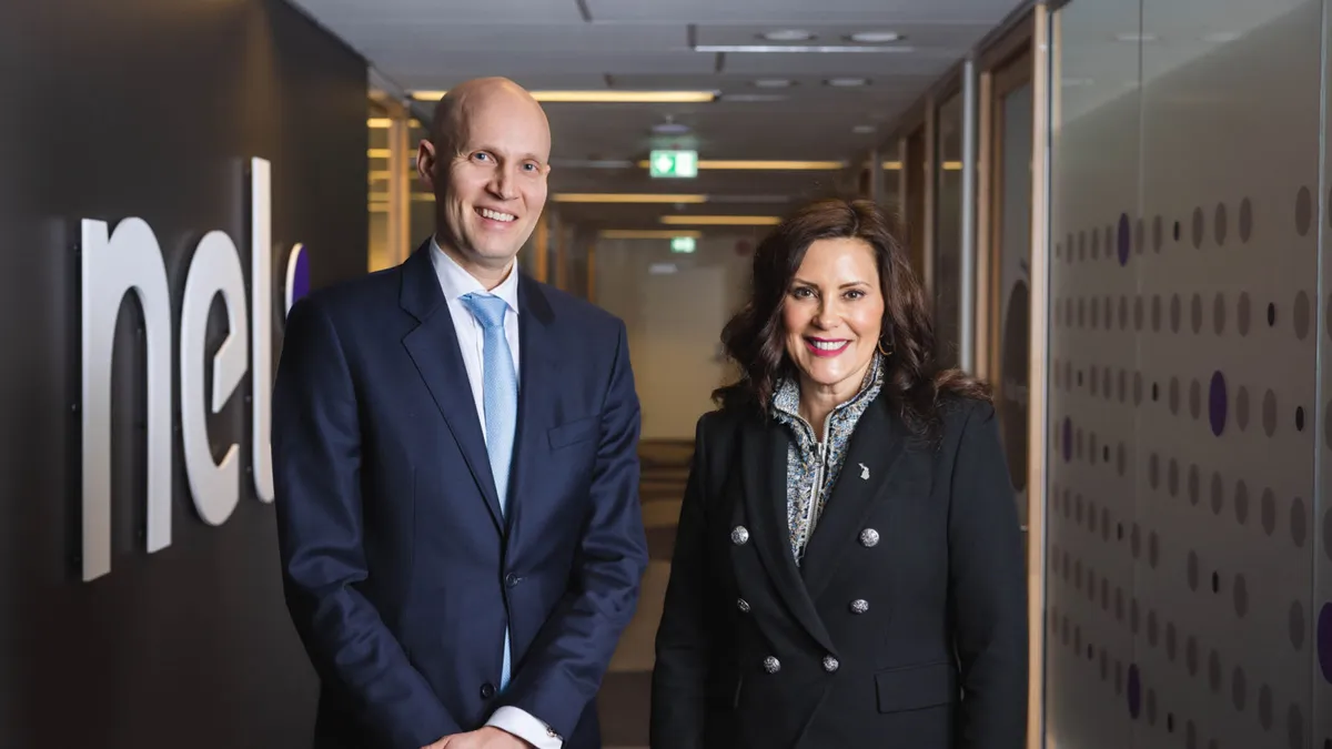 Nel CEO Håkon Volldal (left) stands alongside Michigan Gov. Gretchen Whitmer (right).