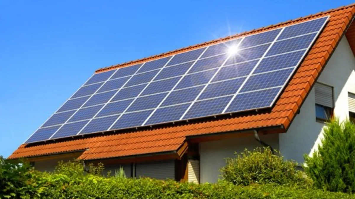 A home with solar panels on the roof.