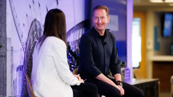 Booking Holdings CFO Ewout Steenbergen speaks at a company Town Hall event.