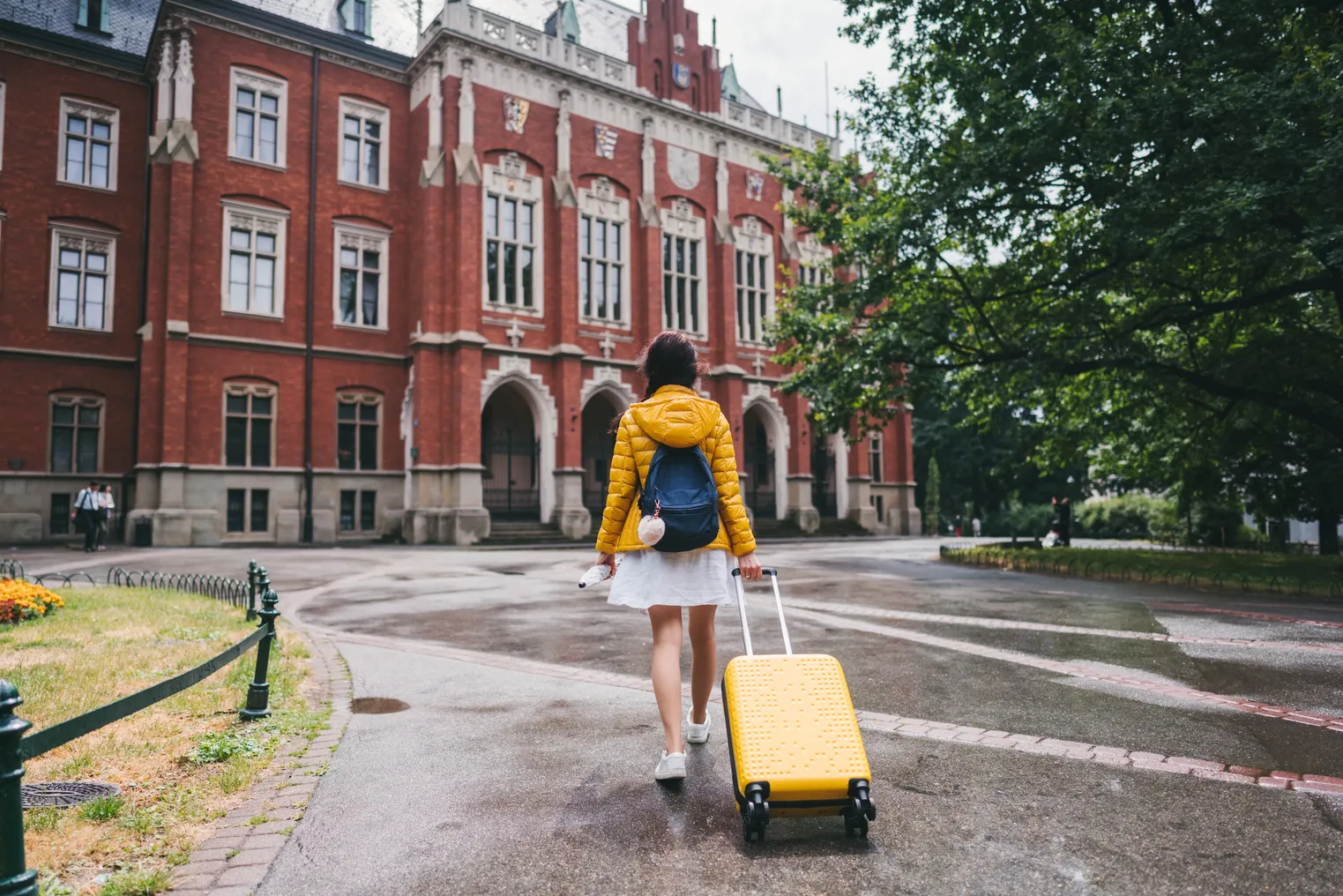 Exchange student with suitcase just arriving to study in Krakow