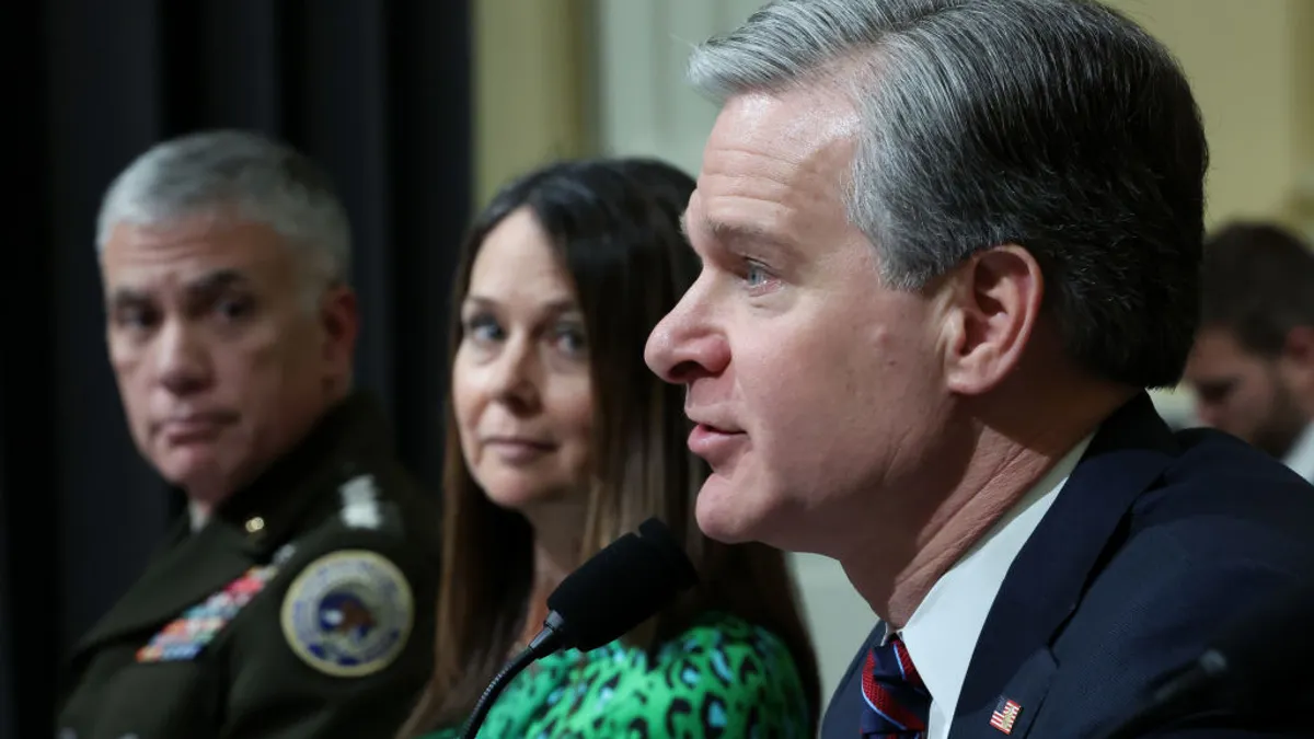 FBI Director Chris Wray speaks at a House Select Committee hearing on Volt Typhoon. CISA Director Jen Easterly and NSA Director Gen. Paul Nakasone look on.